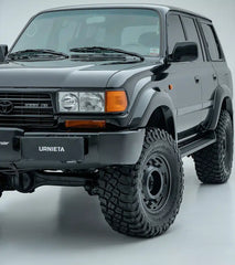 Gray Toyota Land Cruiser with 'Urnieta' branding on a white background