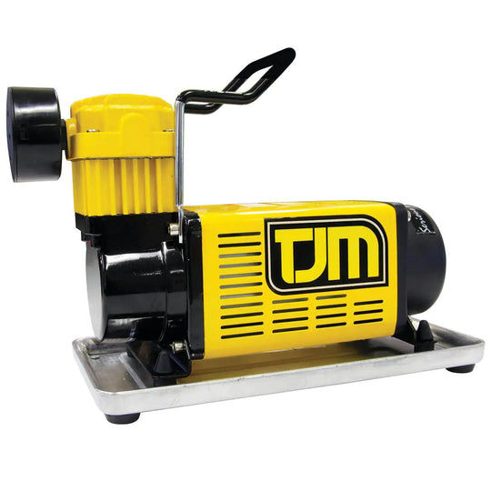 Yellow and black TUM air compressor on a white background