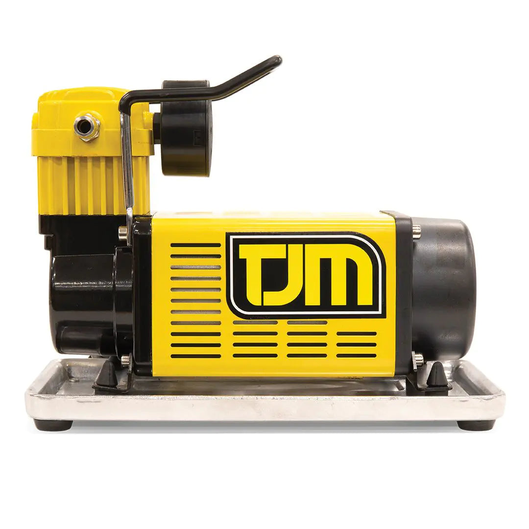 Yellow and black machine with 'TM' logo on a white background